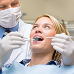 Woman receiving dental checkup