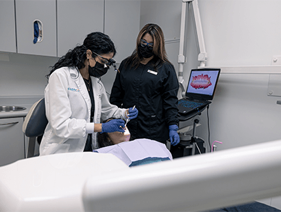 person holding ClearCorrect aligners 