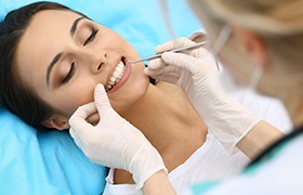 Patient receiving dental treatment