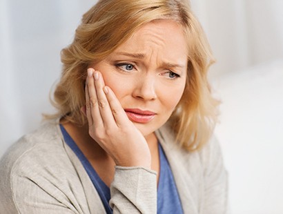 Woman in need of dental implant salvage in New Bedford 