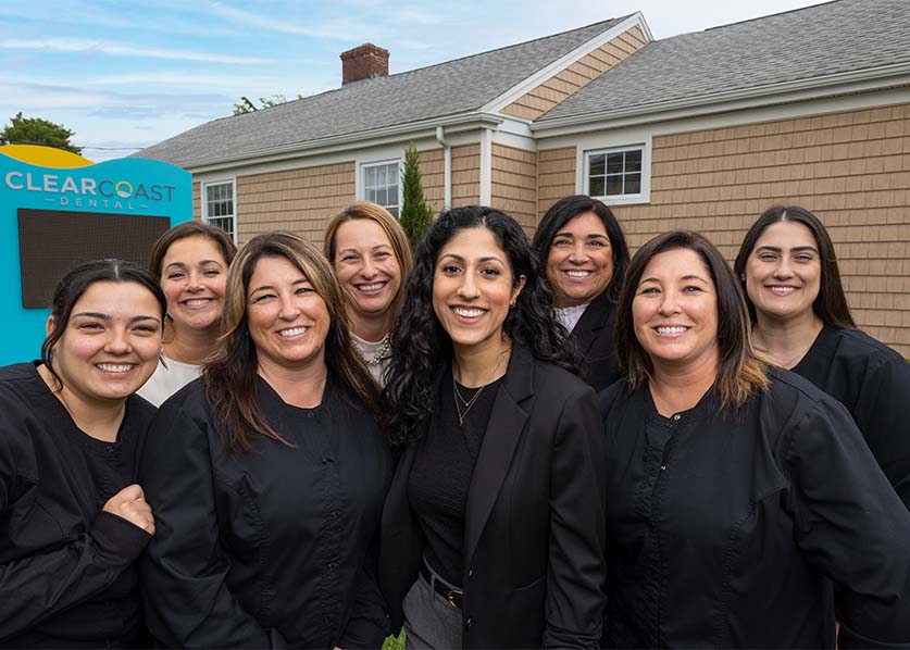 Clear Coast Dental team standing outside of New Bedford dental office