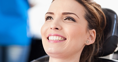 Smiling woman in dental chair