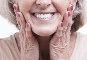 woman with dentures in new bedford