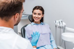 happy woman smiling at dentist