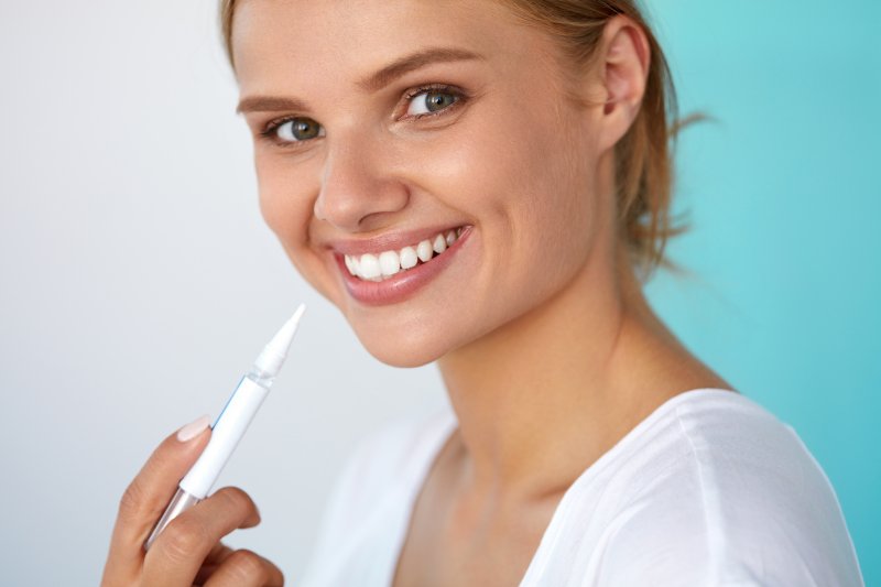 woman smiling after teeth whitening in New Bedford