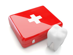 Illustration of a tooth standing next to an emergency kit